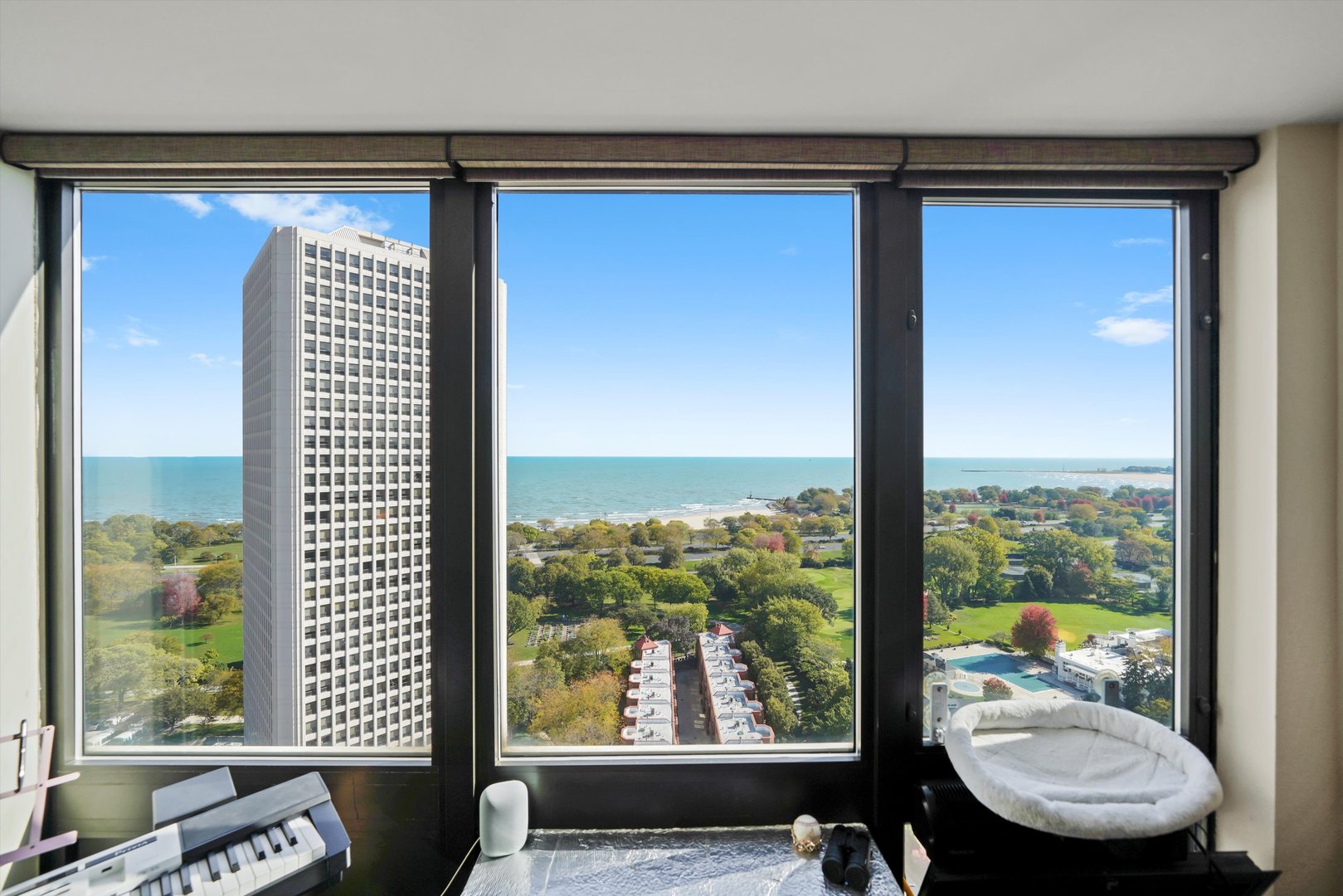 5320 North Sheridan Road, Unit 2304 Chicago, IL 60640 - Photo 13 of 28 a view of a room with furniture and window