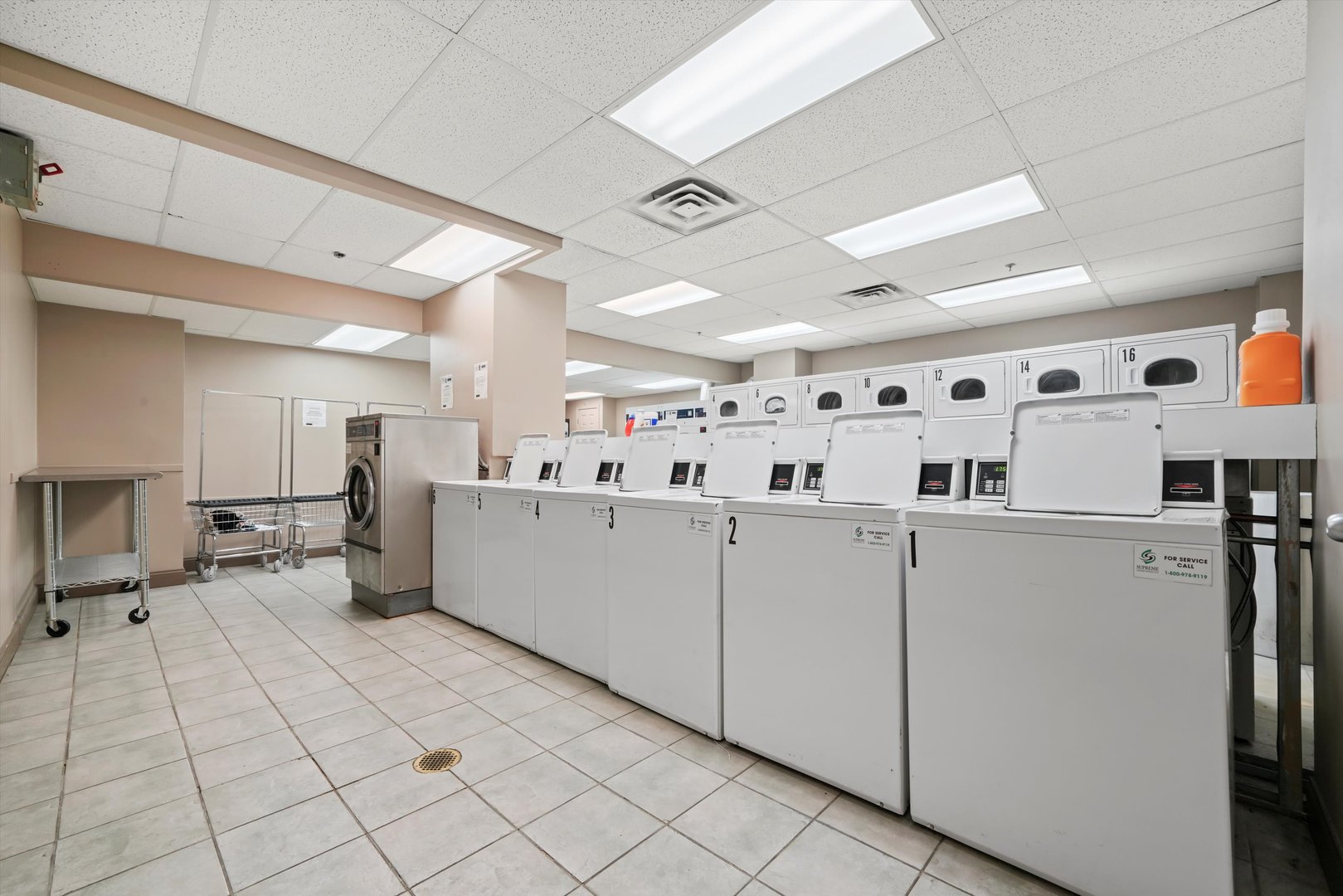 5320 North Sheridan Road, Unit 2304 Chicago, IL 60640 - Photo 20 of 28 a large white room with lots of white appliances