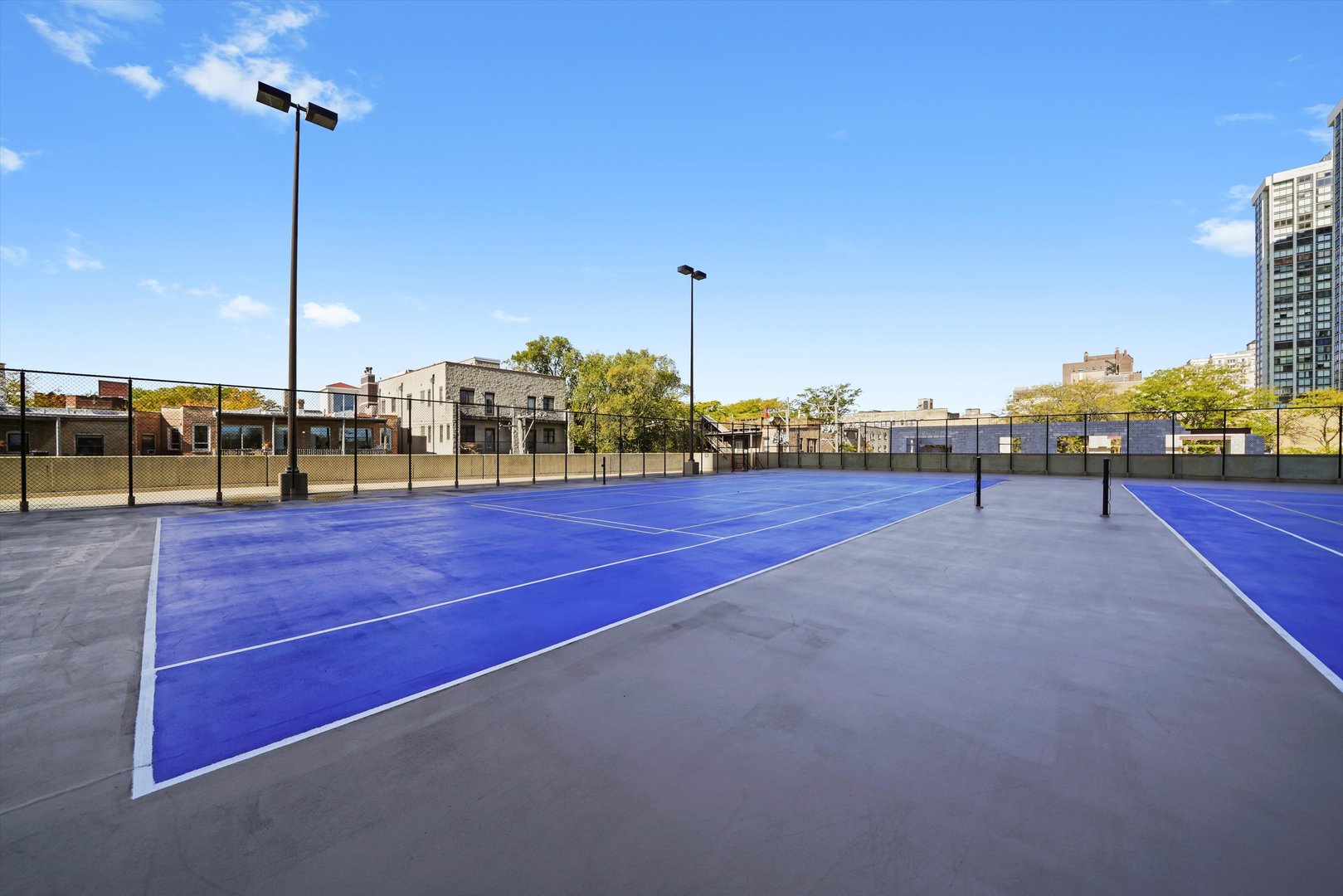 5320 North Sheridan Road, Unit 2304 Chicago, IL 60640 - Photo 27 of 28 a view of a tennis court