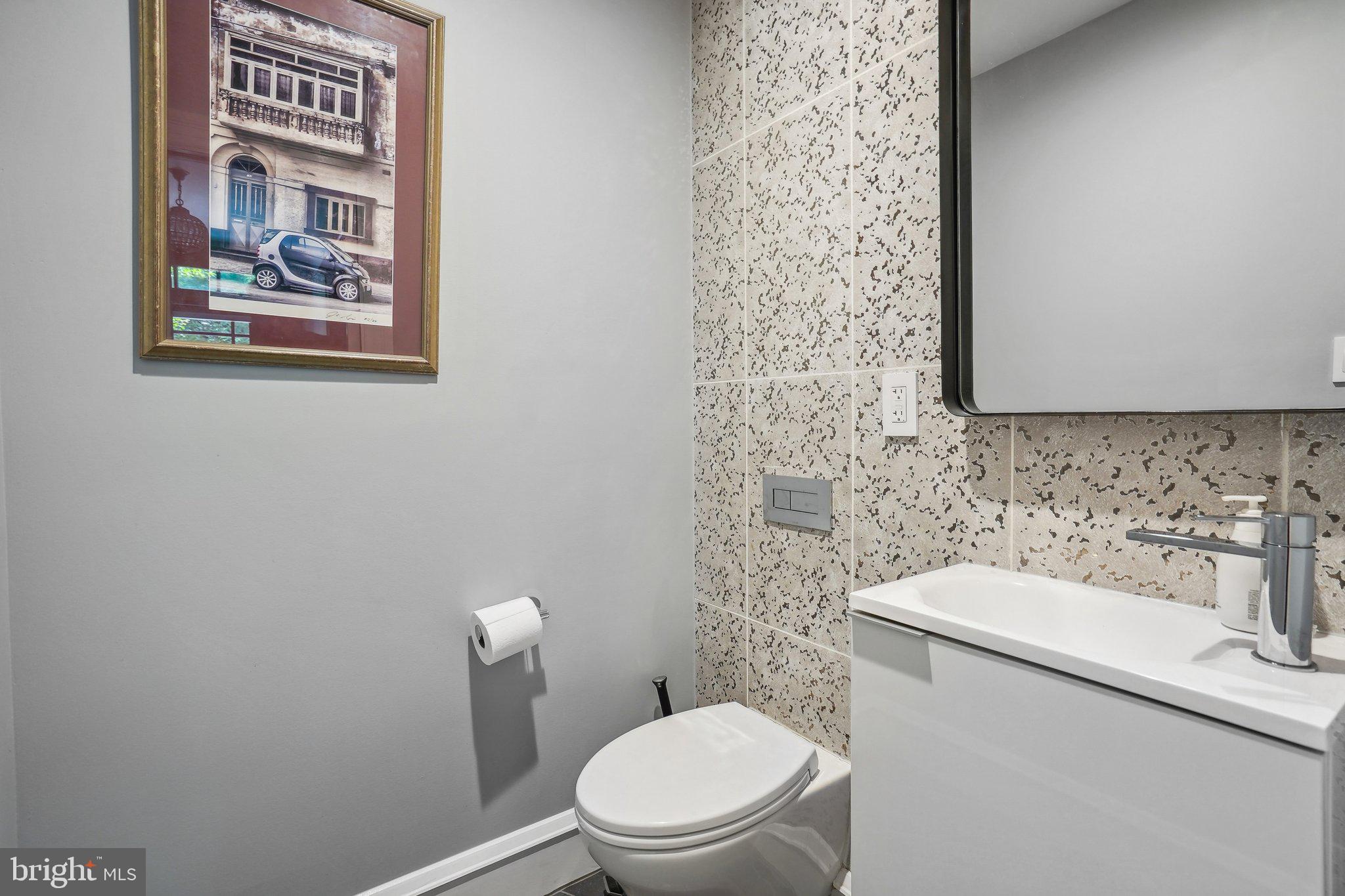 626 D Street Northeast Washington, DC 20002 - Photo 13 of 26 Remodeled 1/2 Bath on Main Level -Rare Convenience