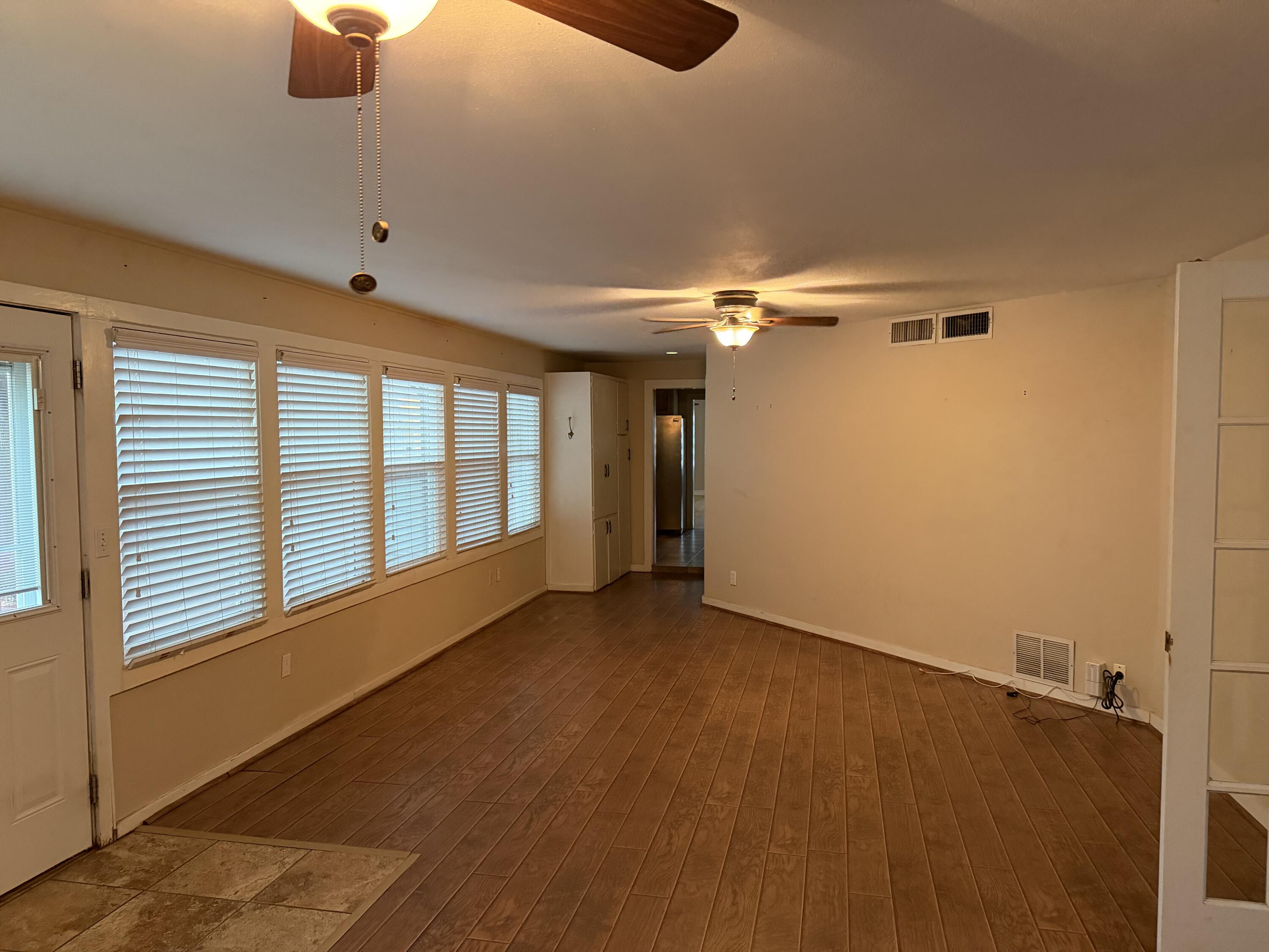 3110 22nd Street Lubbock, TX 79410 - Photo 7 of 22 a view of an empty room with a window
