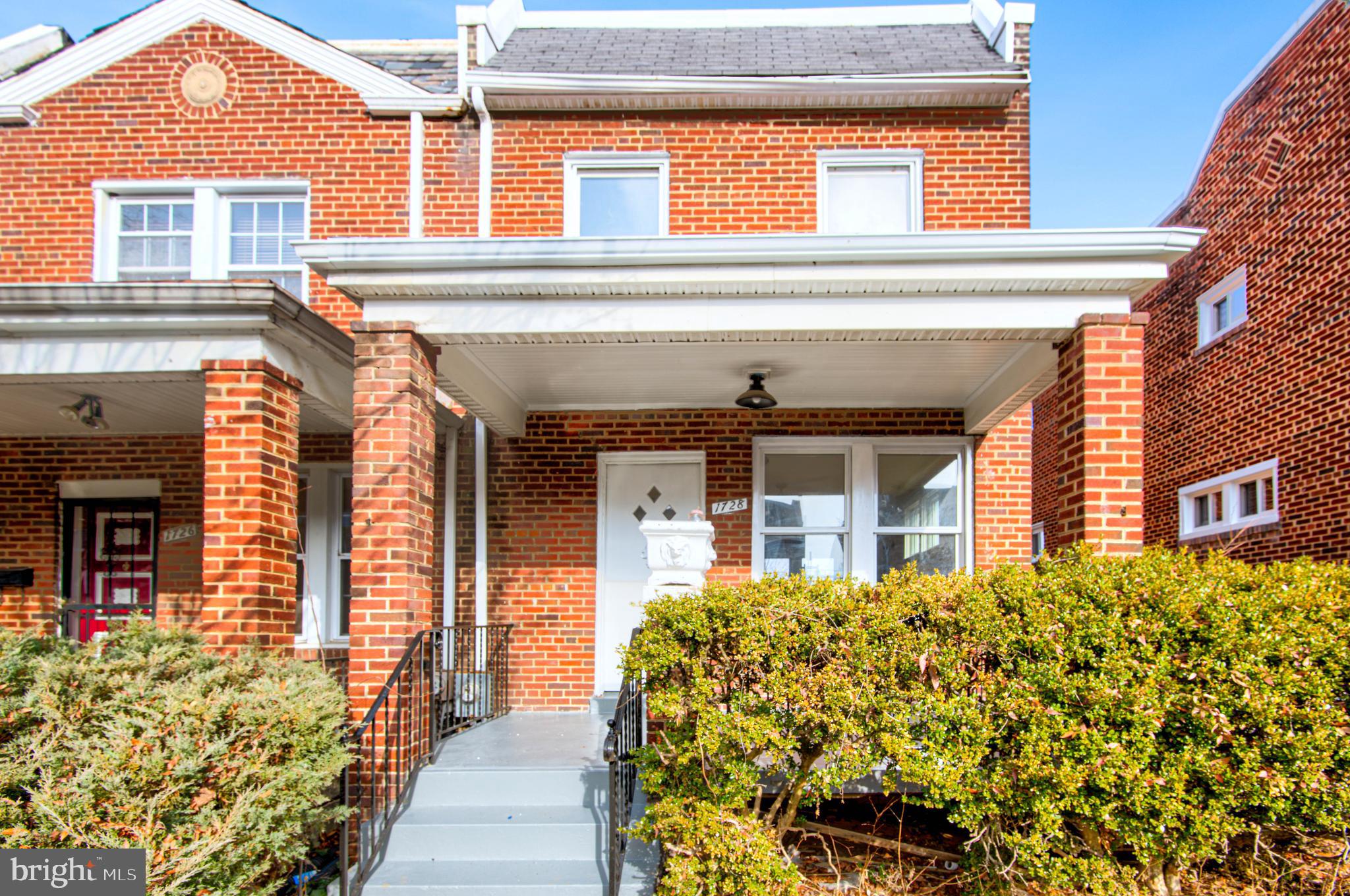 1728 Lang Place Northeast Washington, DC 20002 - Photo 1 of 22 front view of a house