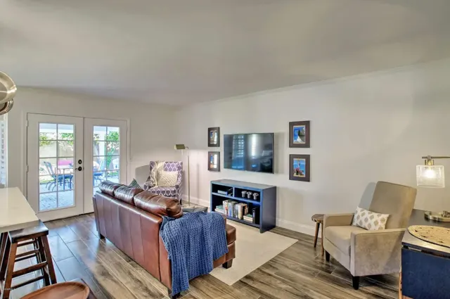 a bedroom with a bed and a lamp