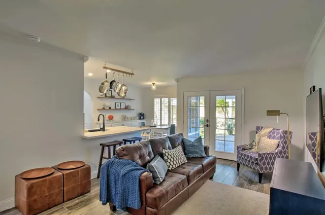 a bedroom with a bed and gym equipment