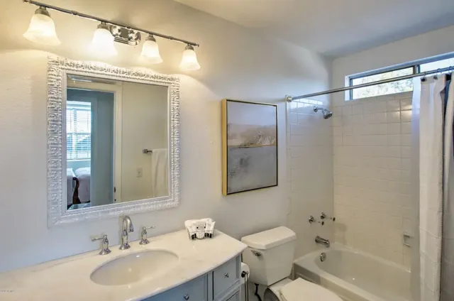 a view of a house with a yard and plants