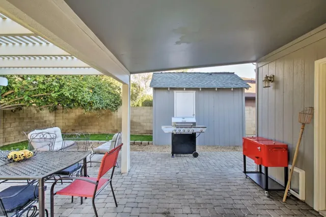 a view of outdoor space and swimming pool