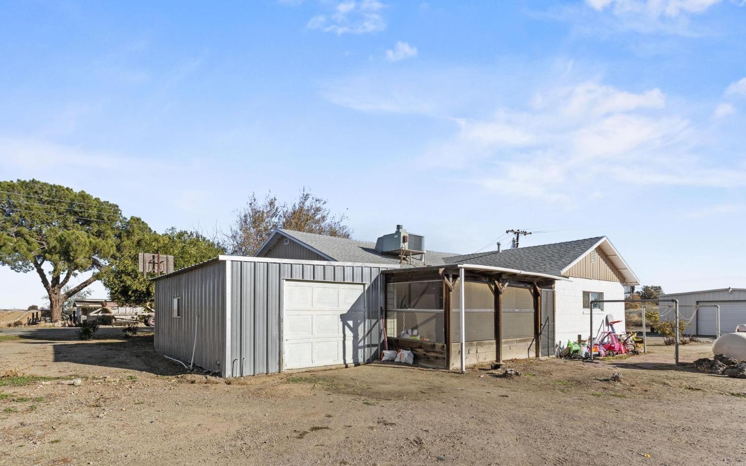 6944 Greenbay Road Arbuckle, CA 95912 - Photo 8 of 18 a view of a house with a yard