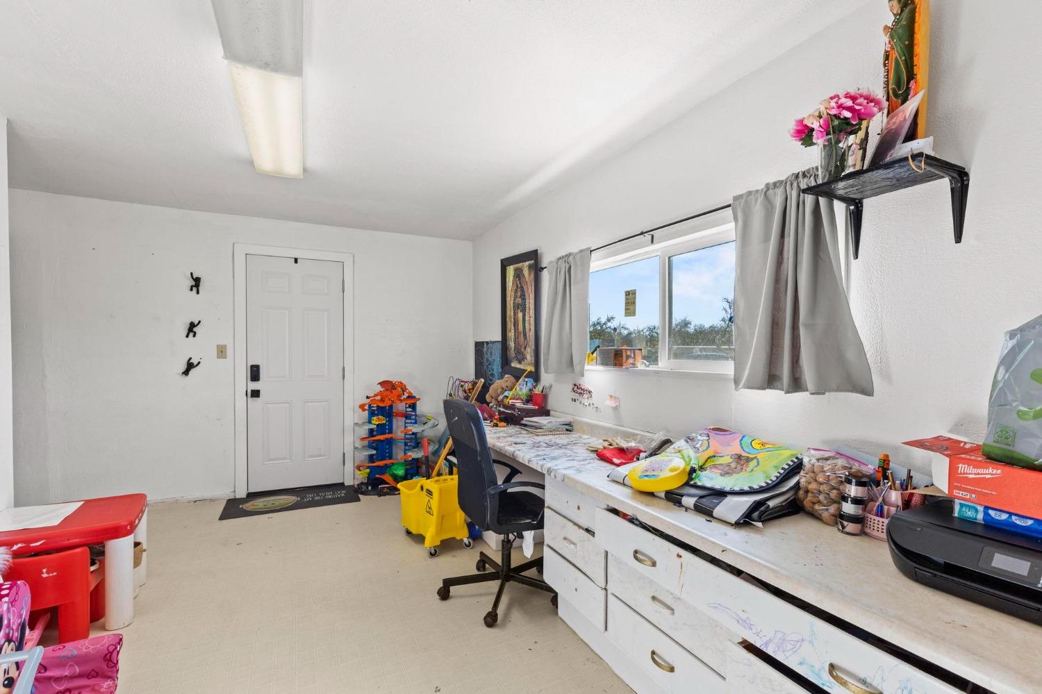 6944 Greenbay Road Arbuckle, CA 95912 - Photo 10 of 18 a view of a kids room with toys and toys