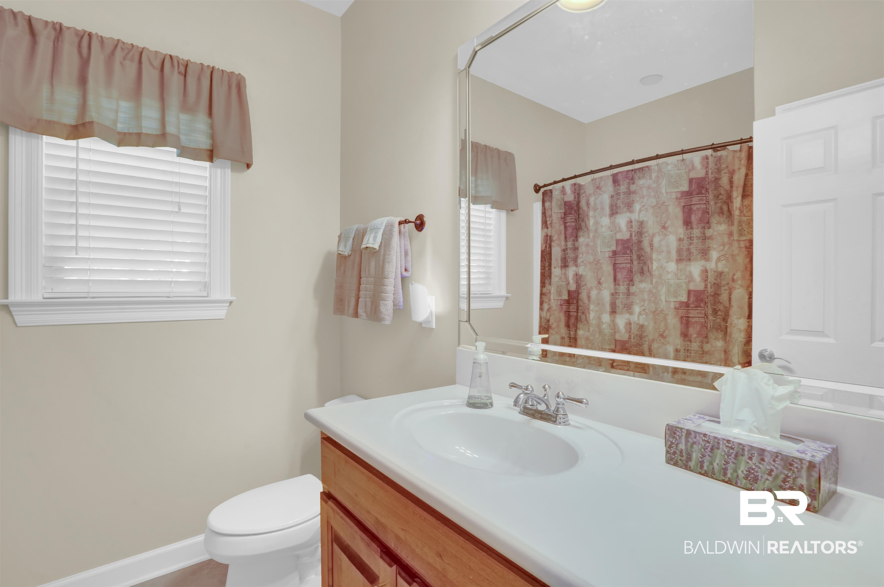 10951 Driver Court Fairhope, AL 36532 - Photo 35 of 46 Bathroom with walk in shower, vanity, and toilet