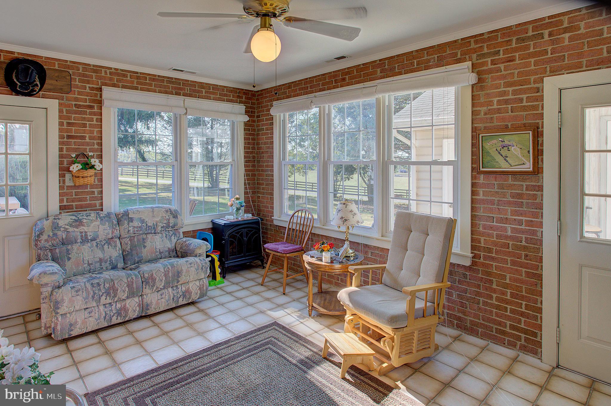 16962 Hamilton Station Road Paeonian Springs, VA 20129 - Photo 21 of 50 Sunroom with tile flooring