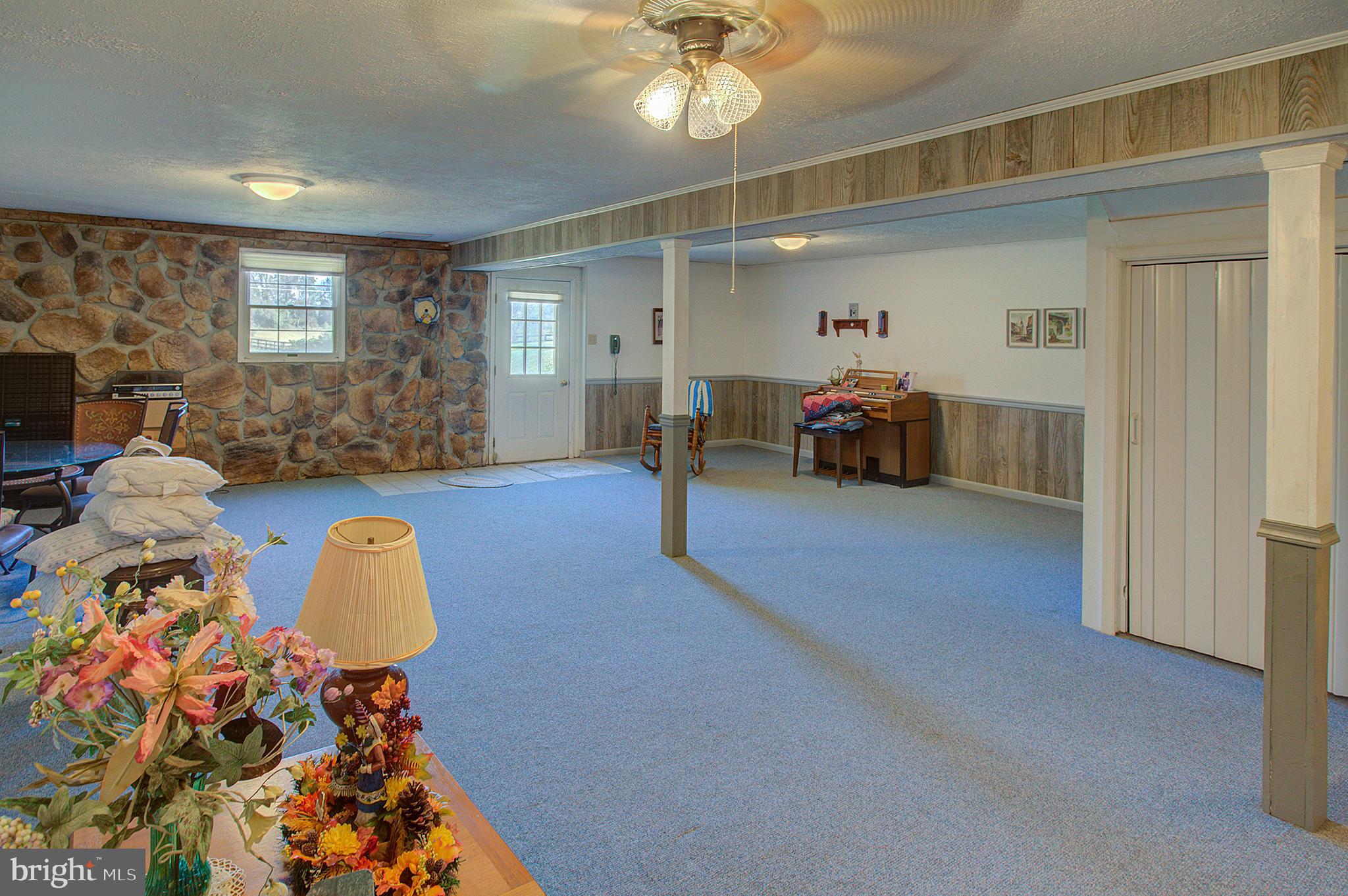 16962 Hamilton Station Road Paeonian Springs, VA 20129 - Photo 25 of 50 Rec Room with door to north side yard