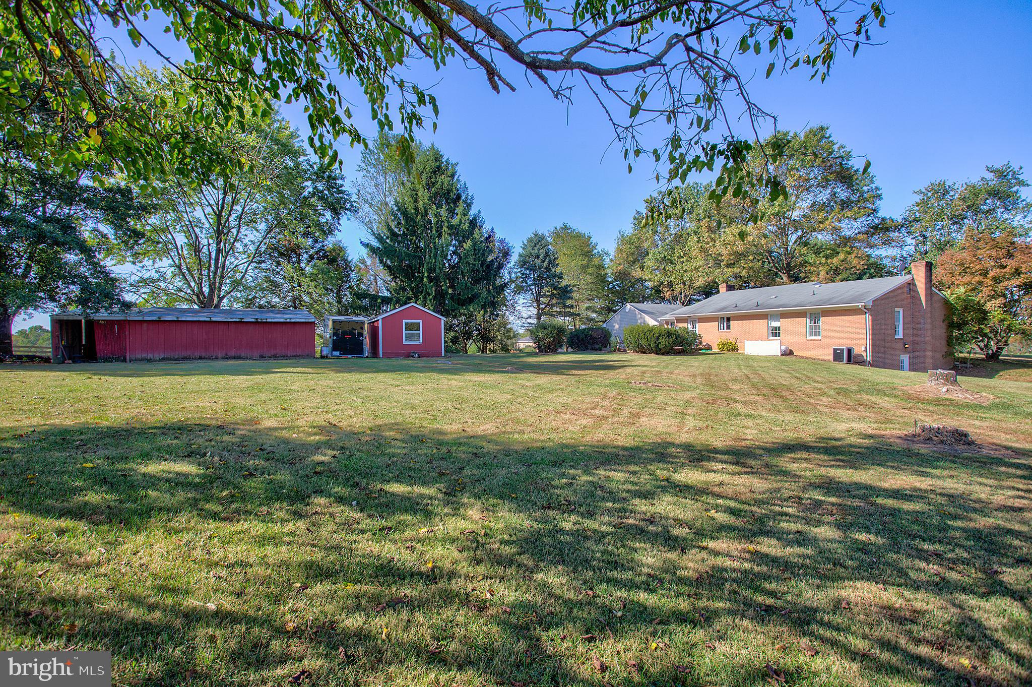 16962 Hamilton Station Road Paeonian Springs, VA 20129 - Photo 30 of 50 Rear yard with barn and shed