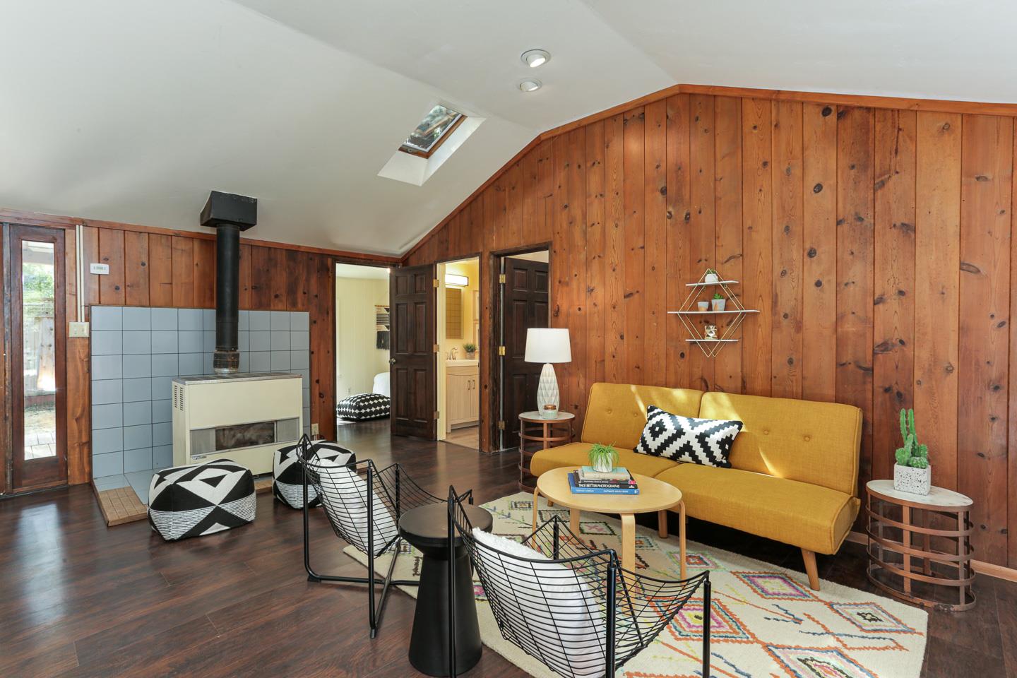136 Pool Drive Boulder Creek, CA 95006 - Photo 11 of 25 a living room with furniture and wooden floor