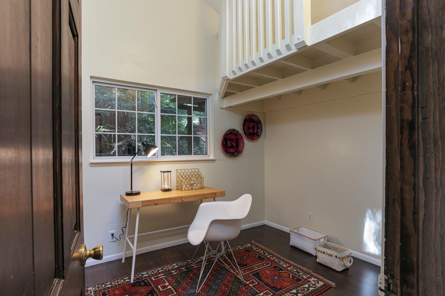 136 Pool Drive Boulder Creek, CA 95006 - Photo 18 of 25 a view of a room that has a window and chair