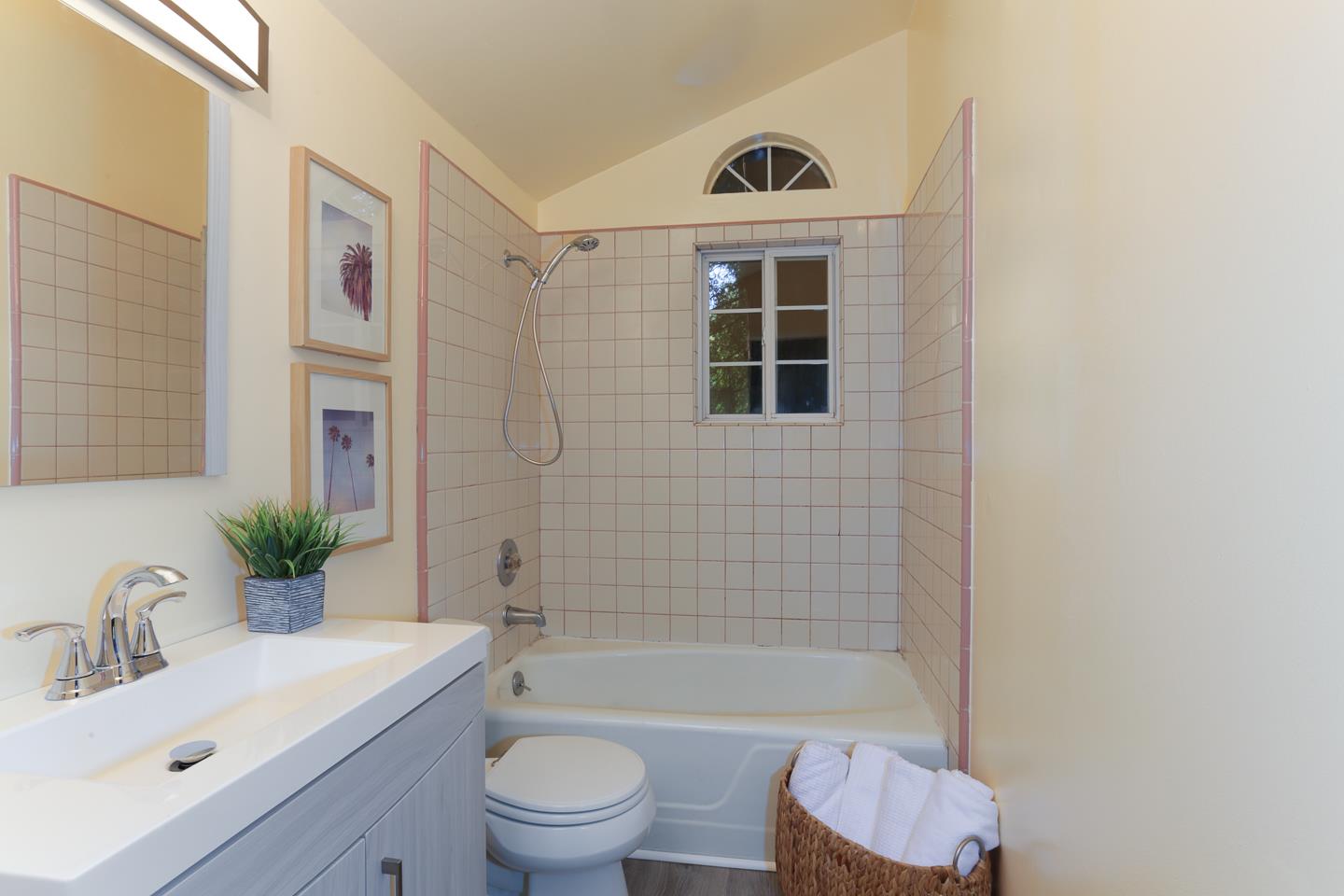 136 Pool Drive Boulder Creek, CA 95006 - Photo 20 of 25 a bathroom with a sink mirror bathtub and toilet