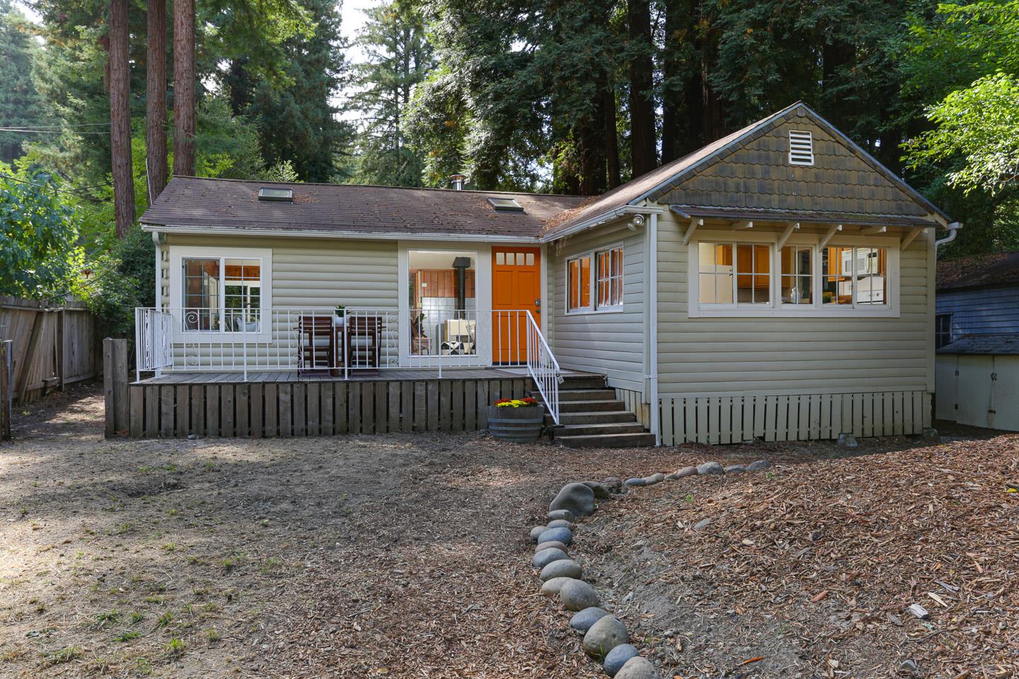 136 Pool Drive Boulder Creek, CA 95006 - Photo 25 of 25 a front view of a house with a yard and garage
