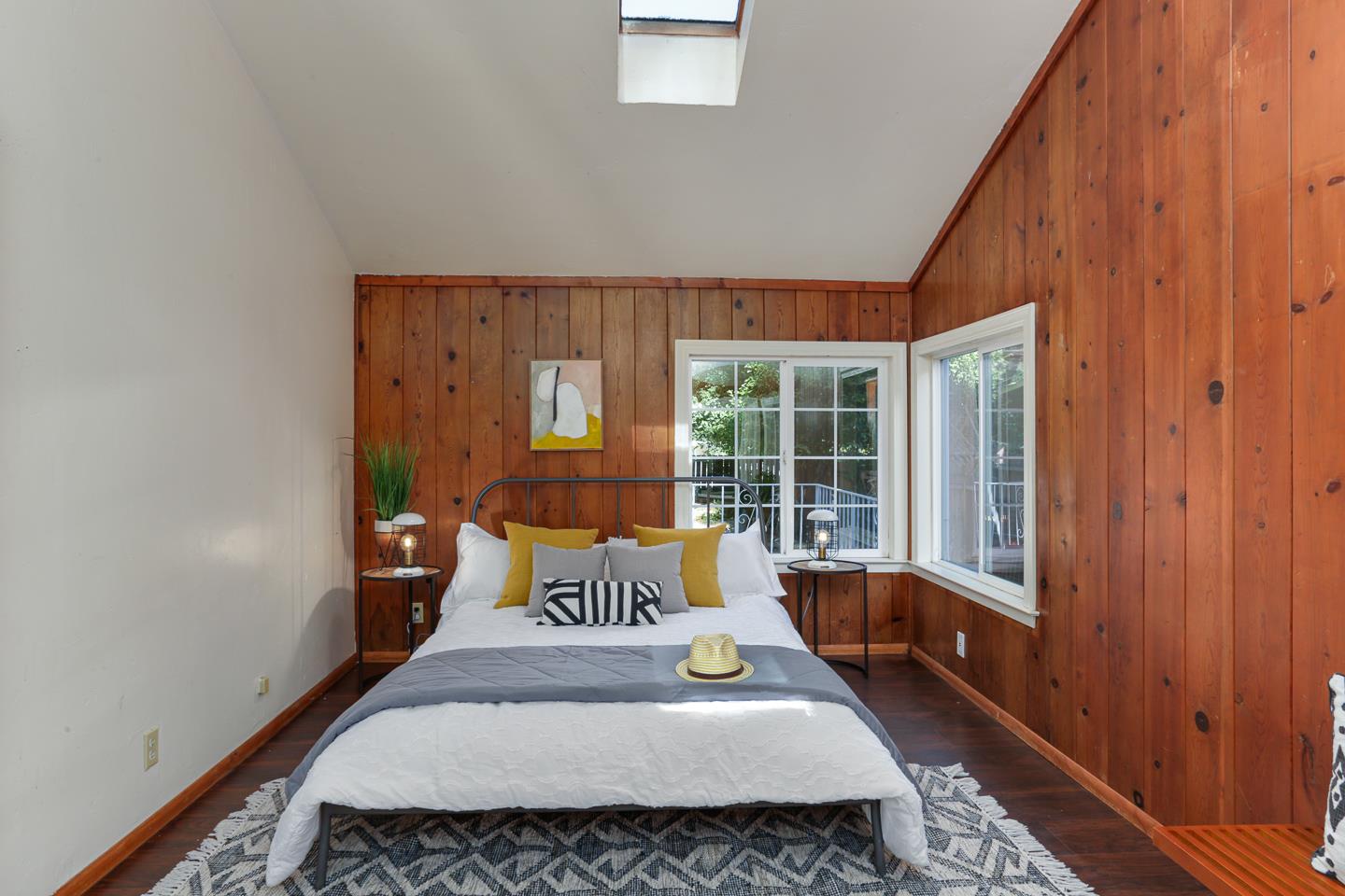 136 Pool Drive Boulder Creek, CA 95006 - Photo 7 of 25 a bedroom with a bed and wooden floor