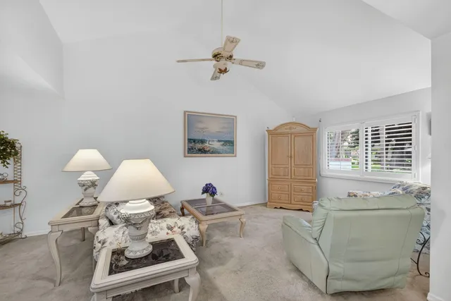 a spacious bathroom with a sink and a large mirror