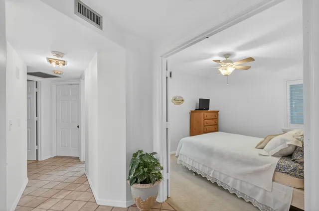 a white toilet and shower