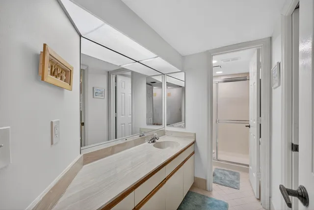 a living room with furniture cabinets and window