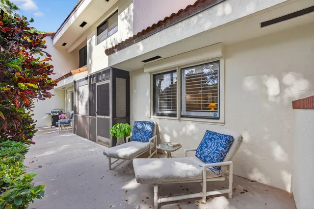 an aerial view of residential house with outdoor space and swimming pool