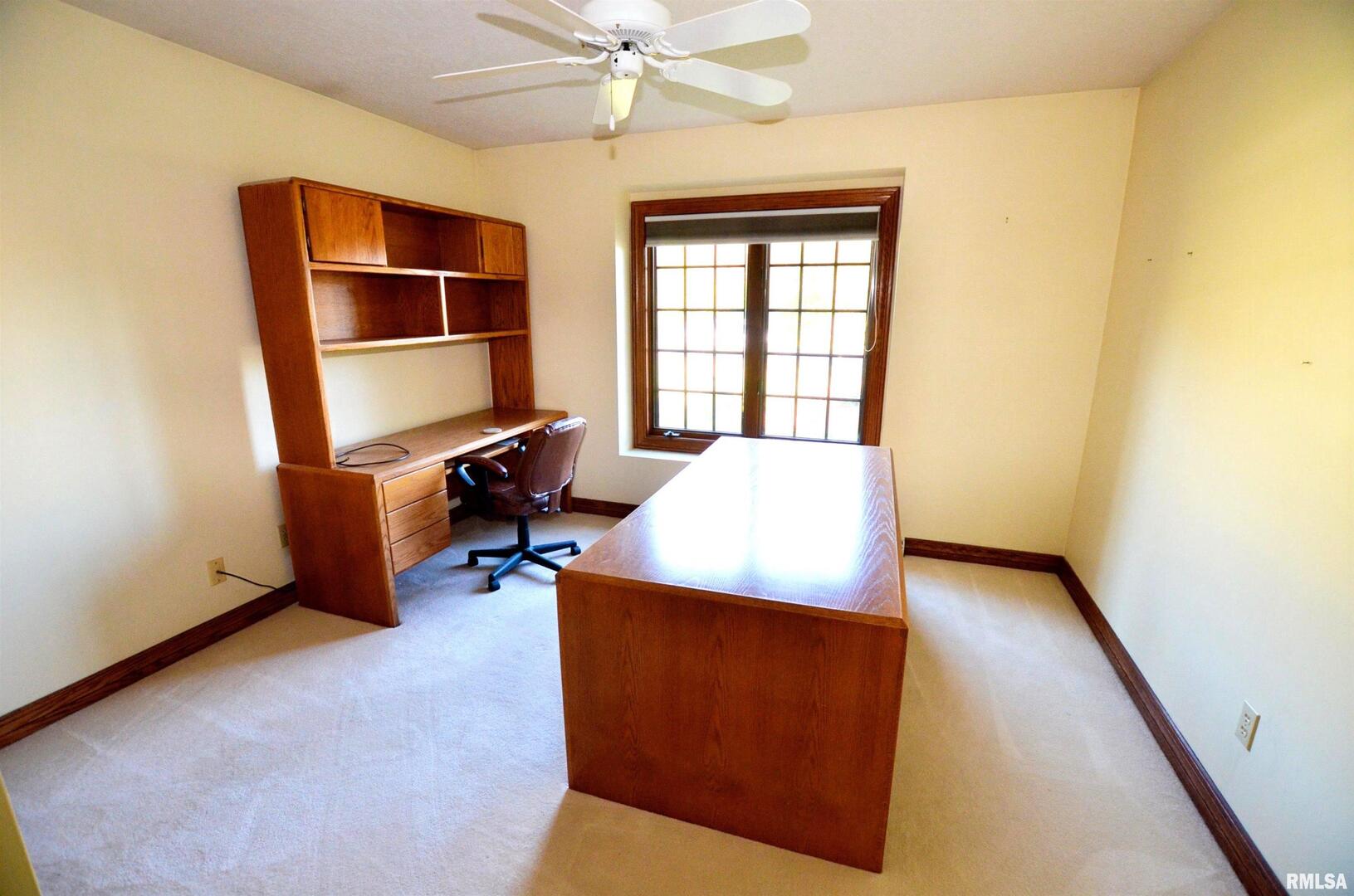 3 Chestnut Drive Blue Grass, IA 52726 - Photo 7 of 15 a workspace with furniture and window