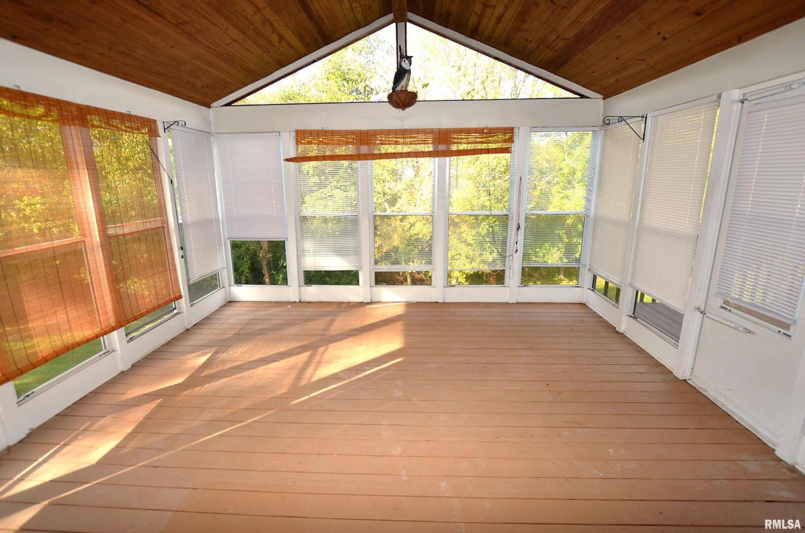 3 Chestnut Drive Blue Grass, IA 52726 - Photo 9 of 15 a view of an empty room with a window