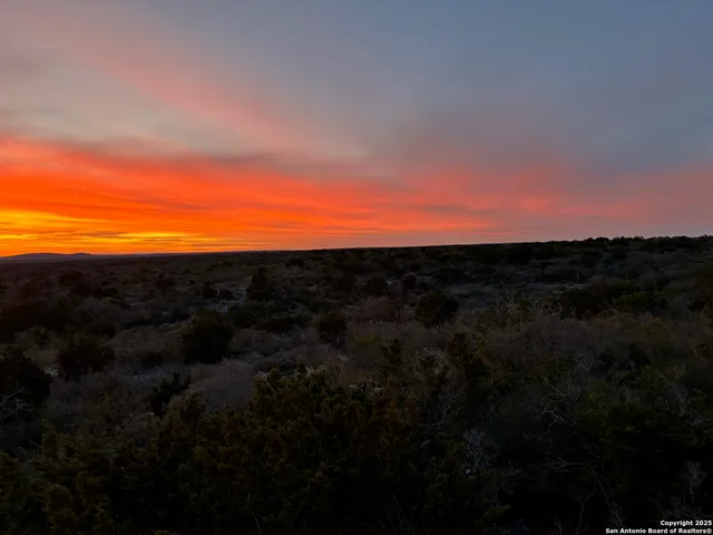 a view of mountain view with mountains in the background