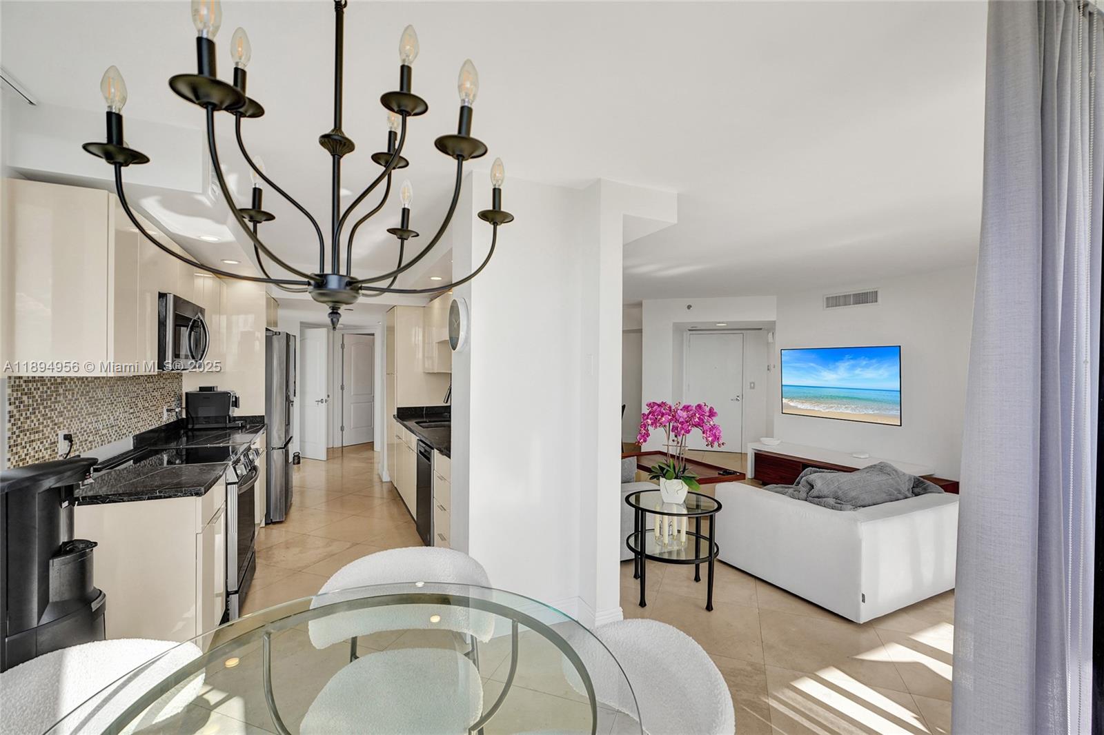 1000 East Island Boulevard, Unit 1403 Aventura, FL 33160 - Photo 23 of 99 Kitchen + Breakfast + Living Room