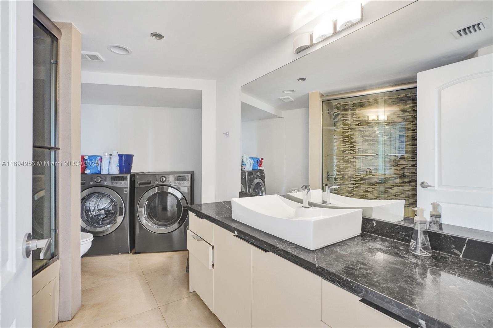 1000 East Island Boulevard, Unit 1403 Aventura, FL 33160 - Photo 37 of 99 Bathroom + Laundry