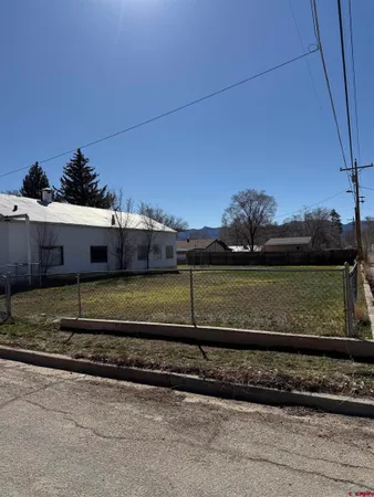 a view of a yard with an outdoor space