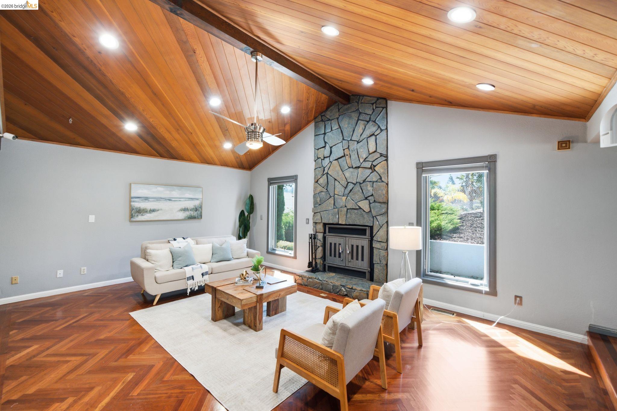 11133 Golf Links Road Oakland, CA 94605 - Photo 19 of 57 Vaulted wood-paneled ceiling with recessed lighting and a ceiling fan