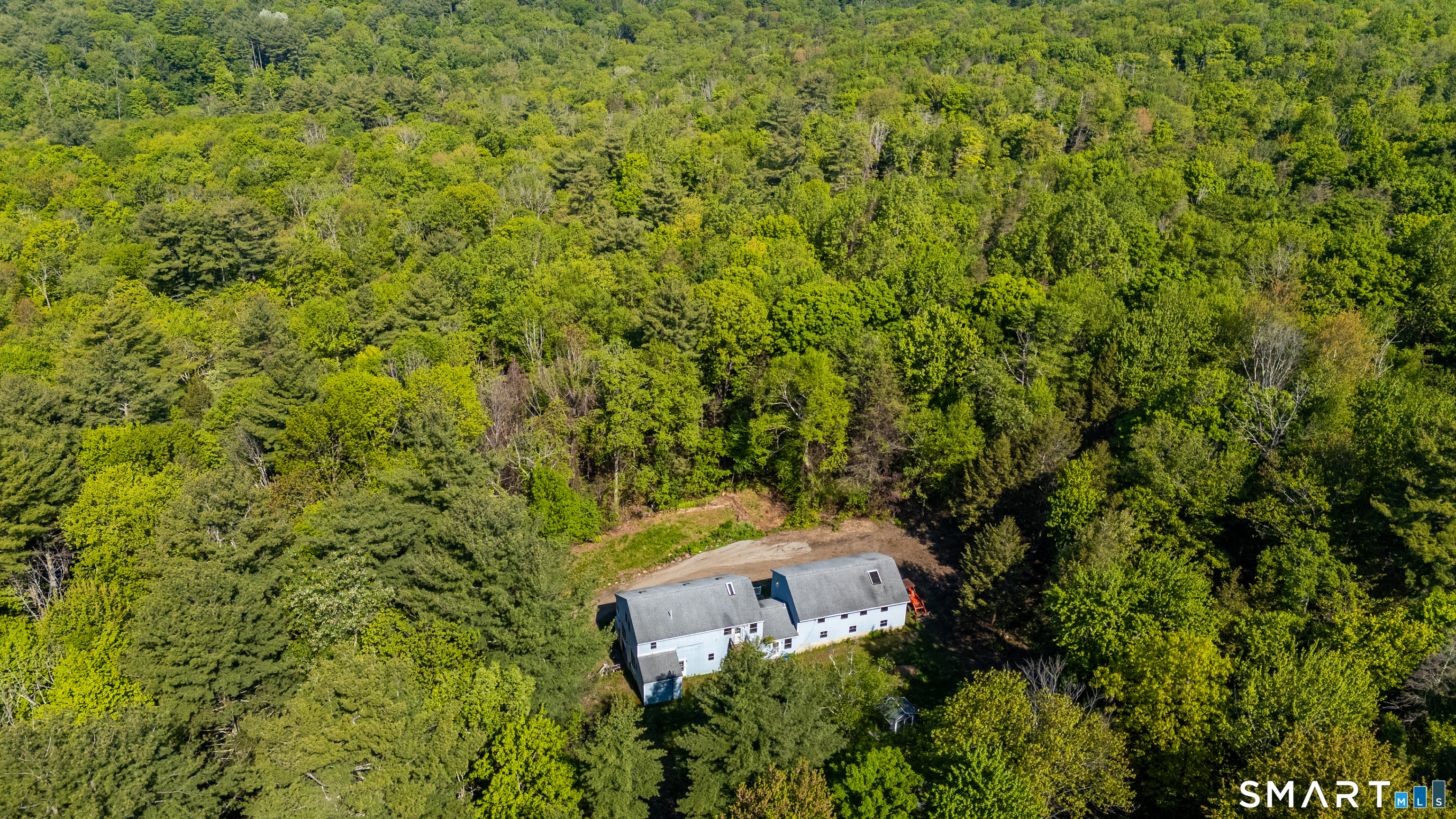 315 West Hill Road Torrington, CT 06790 - Photo 34 of 40 an aerial view of a house with a yard