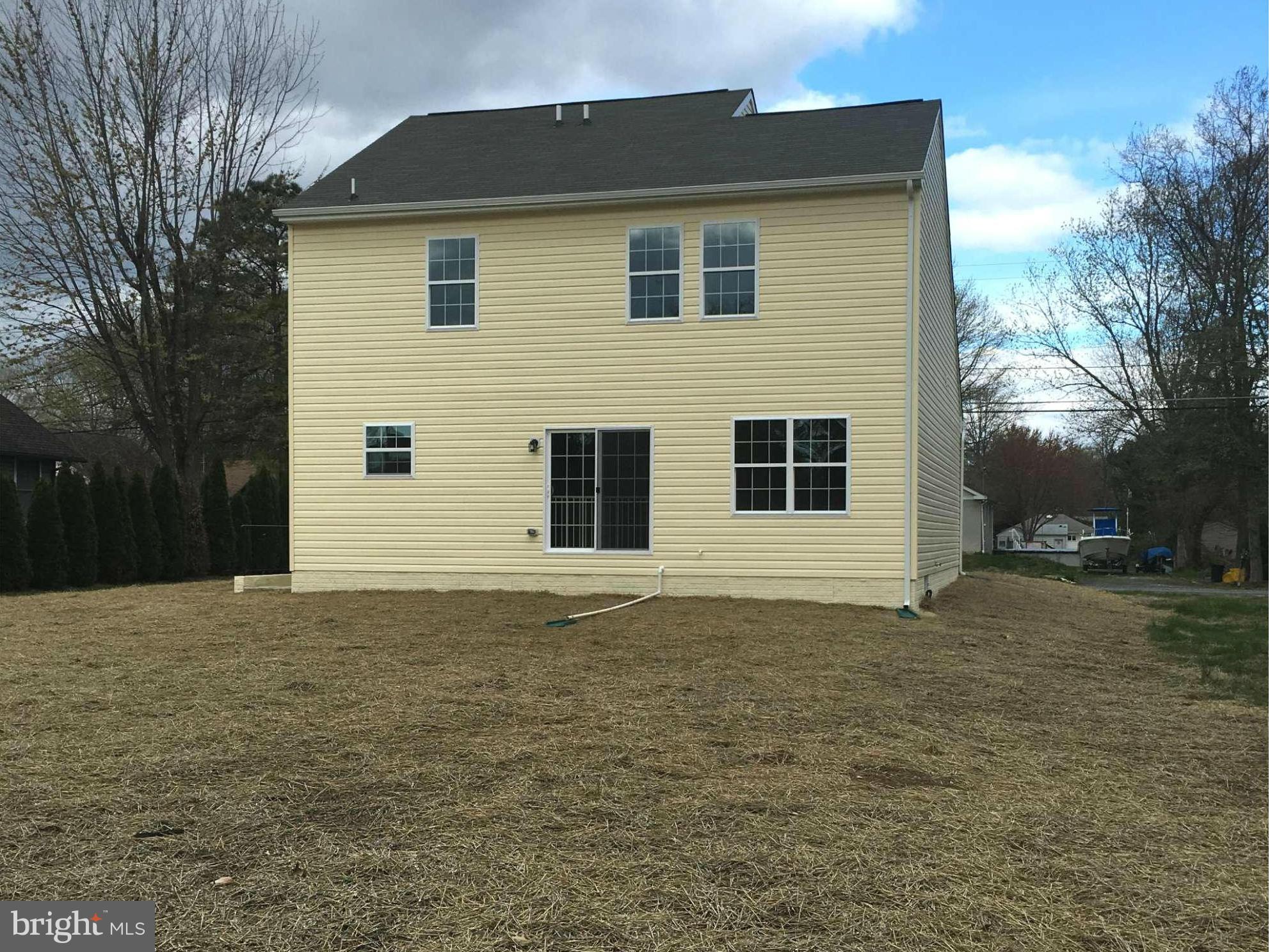 13213 Choptank Road Baltimore, MD 21220 - Photo 10 of 10 a front view of a house with a yard