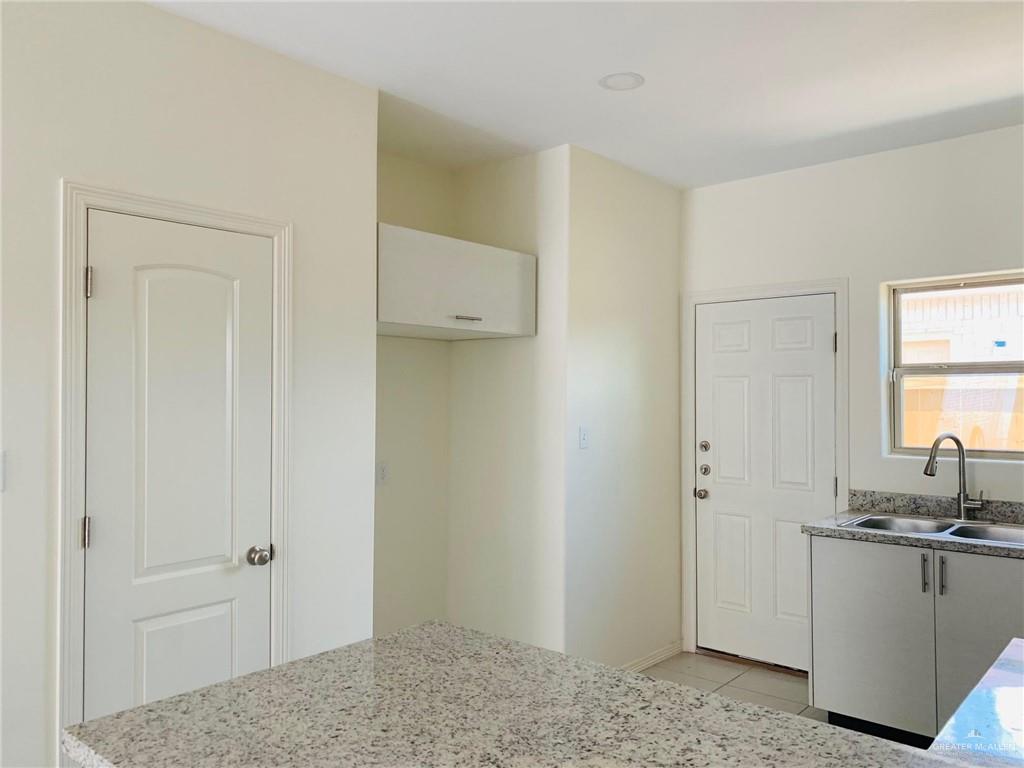 810 South Michigan Street, Unit 2 Alton, TX 78573 - Photo 3 of 14 a view of a storage & utility room in a house