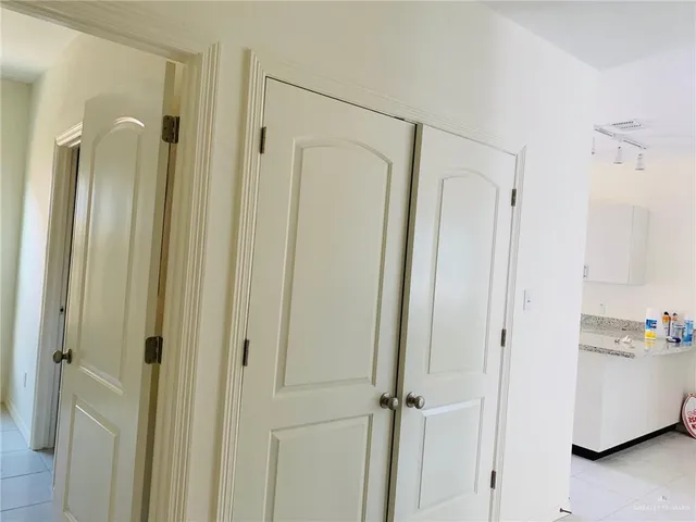 a bathroom with a shower and a tub