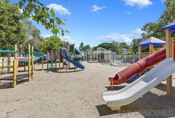 242 Village Green Road Encinitas, CA 92024 - Photo 14 of 16 a view of a swimming pool with a lounge chairs