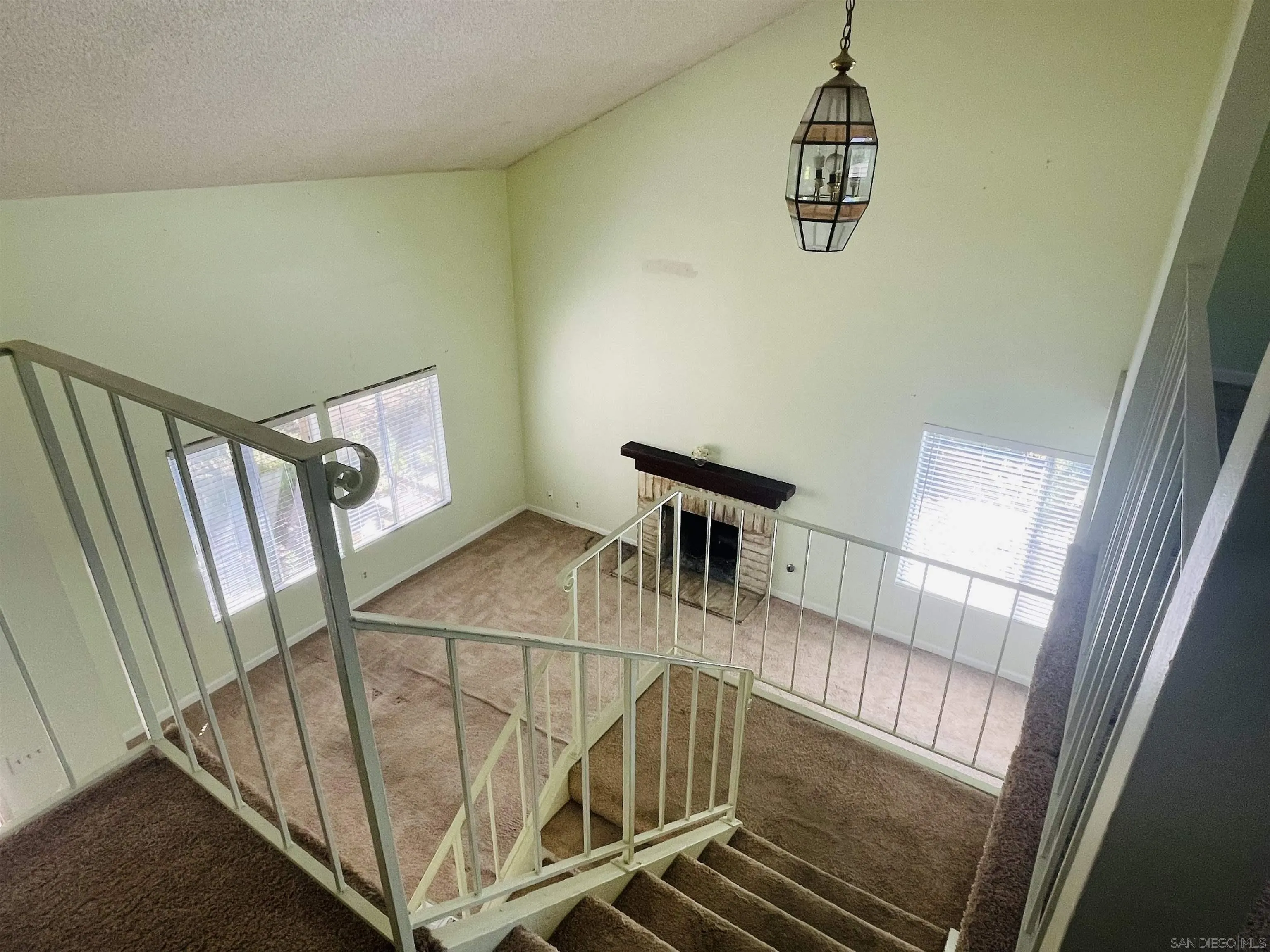 242 Village Green Road Encinitas, CA 92024 - Photo 8 of 16 a view of entryway and hall with wooden floor