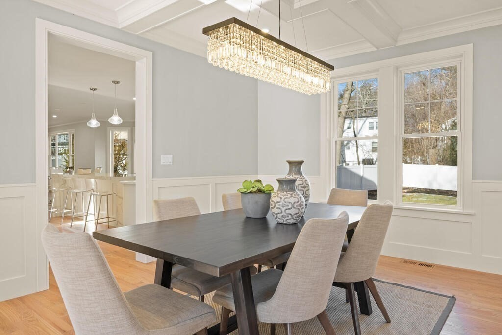 40 Bridge Street Lexington, MA 02421 - Photo 12 of 42 a view of a dining room with furniture and wooden floor