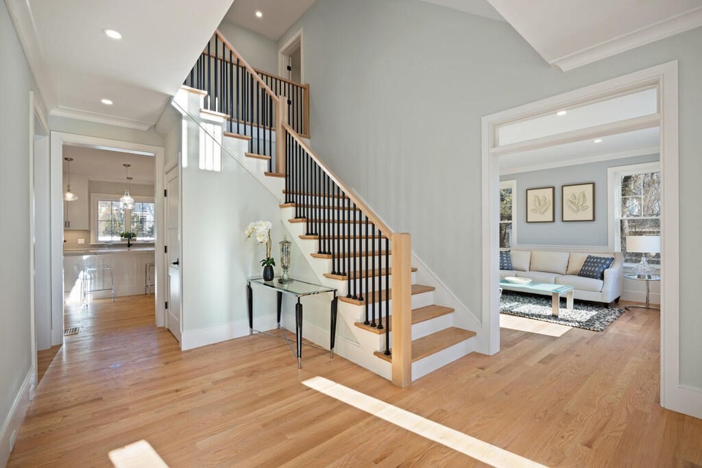 40 Bridge Street Lexington, MA 02421 - Photo 4 of 42 a view of entryway and hall with wooden floor