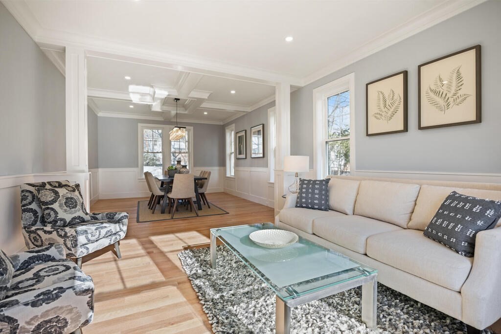 40 Bridge Street Lexington, MA 02421 - Photo 6 of 42 a living room with furniture and a table