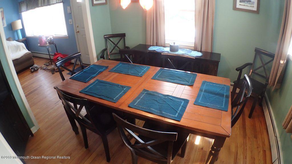 20 McClintock Street Ocean Grove, NJ 07756 - Photo 3 of 19 a living room with furniture and wooden floor