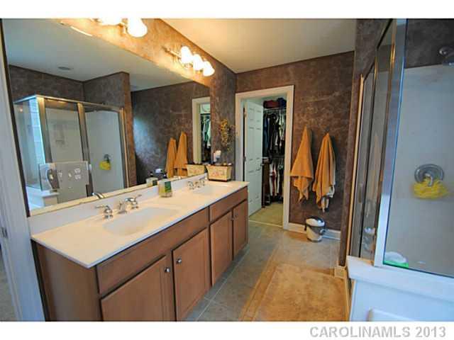 3228 Williams Station Road Matthews, NC 28105 - Photo 12 of 16 a bathroom with a sink double vanity