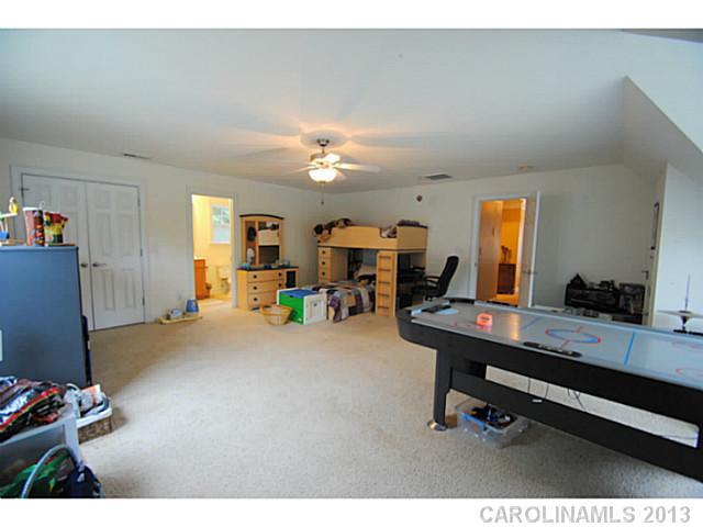 3228 Williams Station Road Matthews, NC 28105 - Photo 13 of 16 a view of a workspace with furniture and a window