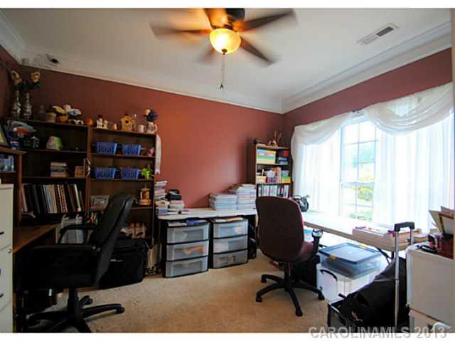 3228 Williams Station Road Matthews, NC 28105 - Photo 5 of 16 a view of a workspace with furniture and a window