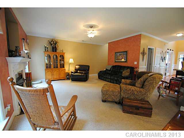 3228 Williams Station Road Matthews, NC 28105 - Photo 7 of 16 a living room with furniture and a flat screen tv