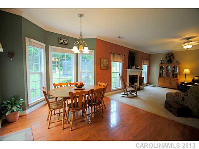 3228 Williams Station Road Matthews, NC 28105 - Photo 8 of 16 a view of a dining room with furniture window and outside view