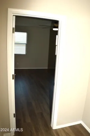 a view of a livingroom with wooden floor