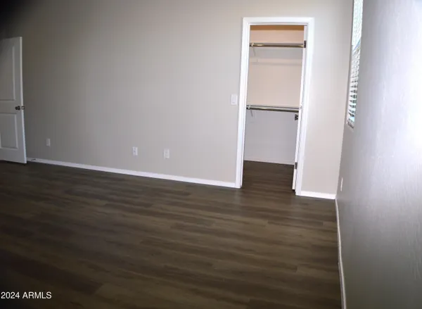 a bathroom with a double vanity sink and mirror