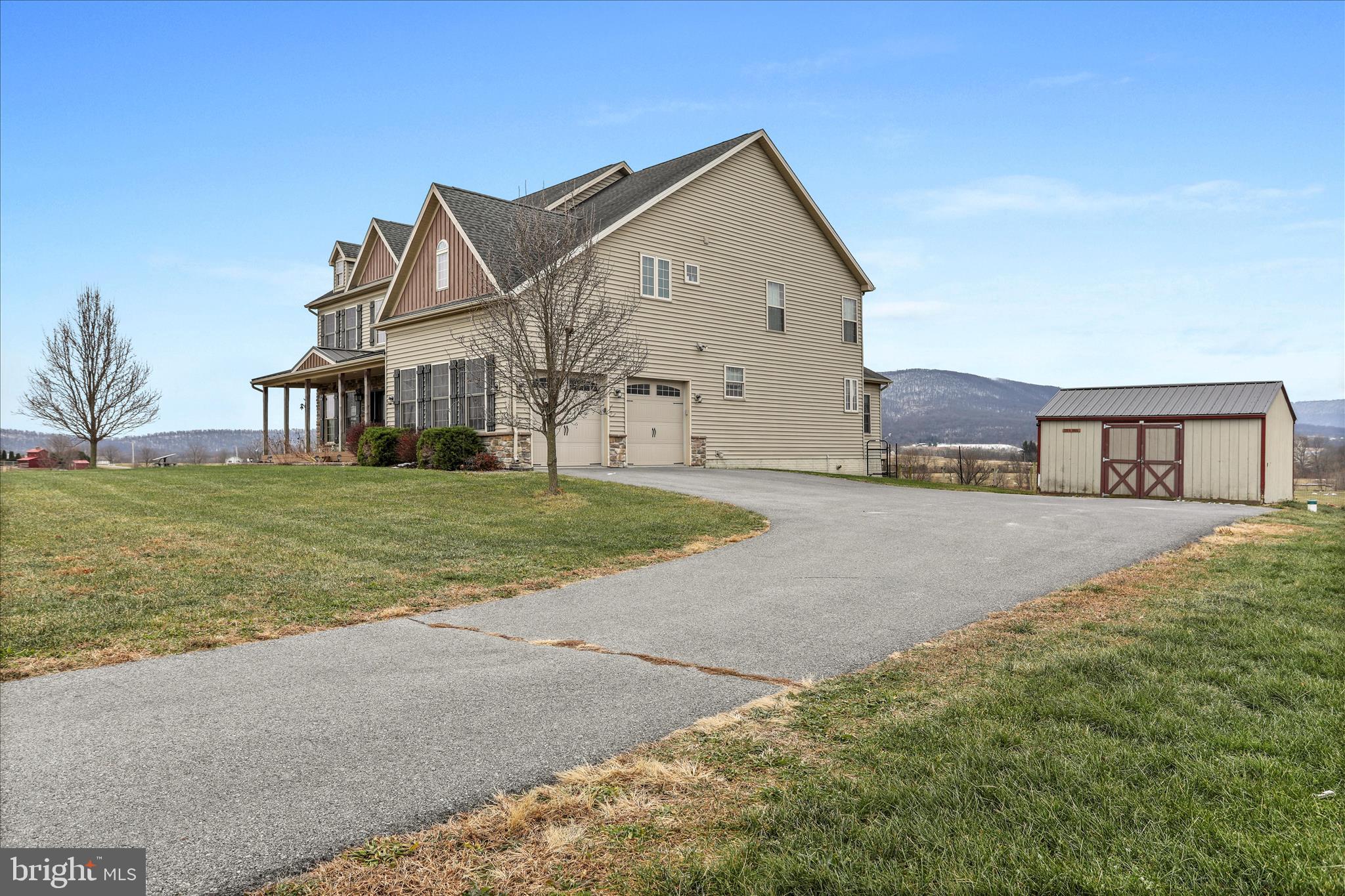 9763 Blue Spring Road Mercersburg, PA 17236 - Photo 80 of 85 a view of a house with a big yard and large trees